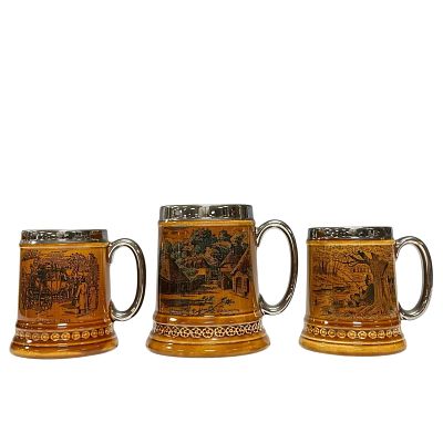 Three (3) LORD NELSON Pottery Mugs. Two measuring approx 5" tall with fishing scene and coaching 