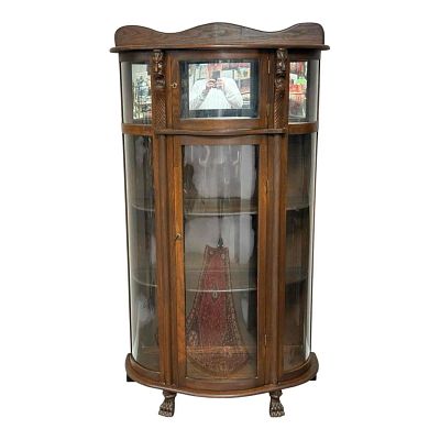20th Century American Curved Glass Oak China Cabinet. Curved glass oak china cabinet with two 