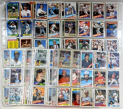 over 300 SPORTS CARDS in SHEETS. UNSEARCHED LOT of BASEBALL CARDS - MOSTLY 1980s - LOADED WITH STARS