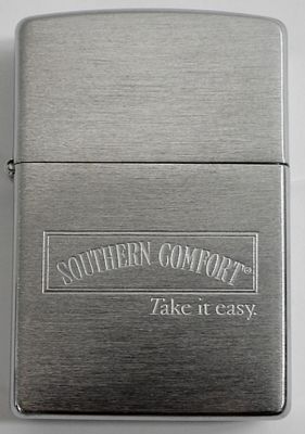 1997 SEALED SOUTHERN COMFORT ZIPPO. IN A ZIPPO BOX, ETCHED SOUTHERN COMFORT TAKE IT EASY ON THE FRONT