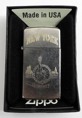 2017 SEALED NEW YORK LIBERTY SLIM ZIPPO. IN A ZIPPO BOX, NEW YORK, WITH STATUE OF THE LIBERTY