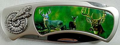 VINTAGE WILDLIFE KNIFE DEER. NEW IN COLORED TIN DEER STAINLESS POCKET KNIFE