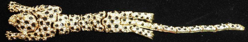 Cheetah Brooch. Gold tone and black stone