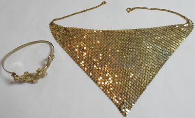 (1) Necklace (1) Bracelet. Both gold-tone. The bracelet features an alligator.