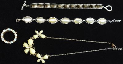 (2) Bracelets (1) Brooch (1) Necklace. Faux opal gem brooch. One Opal is cracked Butterfly necklace