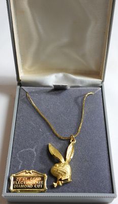 Necklace. Like new in the box 22k gold electroplate Playboy bunny