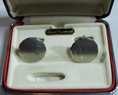 Pair Of Cuff-links. Like new in the box. Silver tone