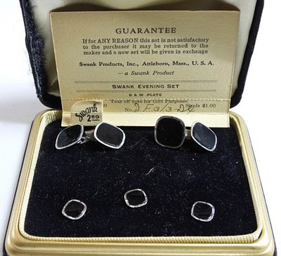 Cuff-links and buttons. Like new in the box. Silver tone and onyx color stones