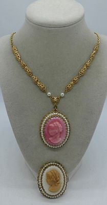 Vintage West Germany Cameos. cameo pin with gold tones and beads around measuring 2" in length 
