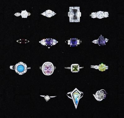 15 Silver Tone Rings. different sizes of rings, silver tone with different faux gems