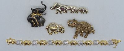 Adorable Elephant Lot. 4 elephant pins, gold tone, 1 elephant bracelet 8", gold tone with rhinestones