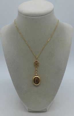 Beautiful Gold Tone Locket. 17" gold-toned chain, locket pendant is 2"