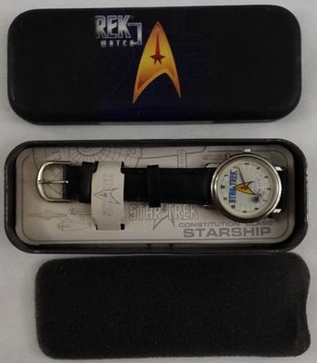 Star Trek Watch In Tin Case. The tin case is worn from the years. The watch band is genuine 