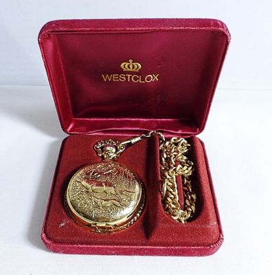 Westclox Deer Pocket Watch With Chain. Still in it original case. Gold-tone, in good condition 