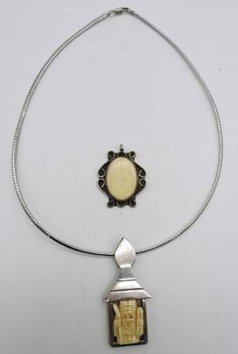 2 Sterling Bone Pendants. Two sterling bone pendants, 1.5-2.5". One sterling chain, 16". (19.4 dwt)