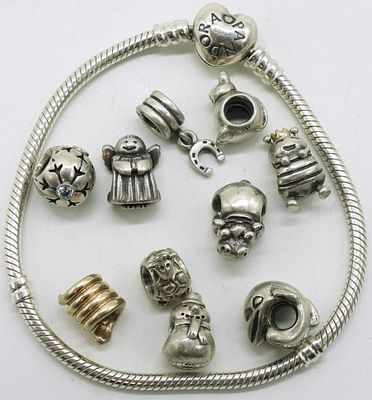 Pandora Bracelet with 10 sterling beads. Pandora heart clasp bracelet, 7" with 10 sterling beads 