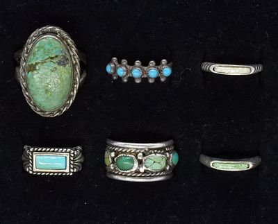 6 Sterling Turquoise Rings. Six sterling turquoise rings, sizes 5-9.5 (23 dwt)