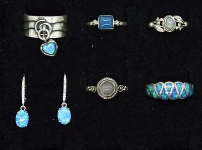 Sterling Rings & Earrings with Opals. Five sterling rings with opals & clear gems. Sizes 8-9. 