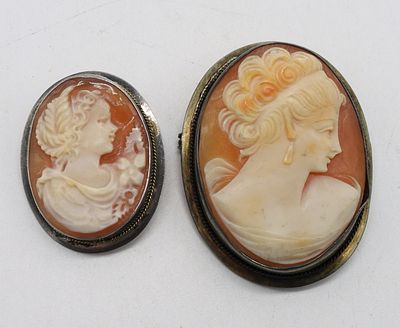 Two Sterling Cameo Brooches. Two sterling cameo brooches, 1" - 1.5"/ Both are brooches and 