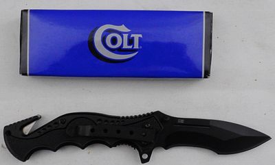 Colt Folding Pocket Knife. Like new in the box, it has a seatbelt cutter and window breaker.