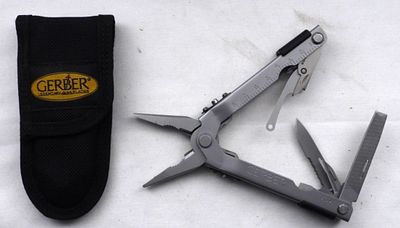 Gerber Multi-Tool Pocket Knife With Sheath. Visit us on Facebook