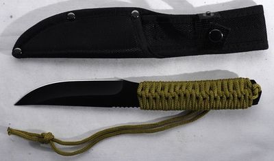 Black Fixed Blade Knife. The handle is wrapped in green paracord and a black nylon sheath