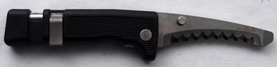 Smith & Wesson First Responder Knife. It has a spring-loaded glass breaker