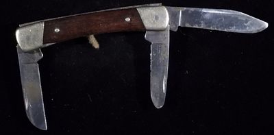 Buck Three-Blade Pocket Knife Number. Used with worn blades