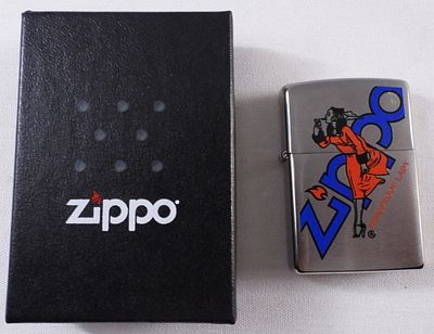 Zippo Windproof Lady Advertising Lighter 2012. Sealed, comes in a box, 2012 Zippo logo with 
