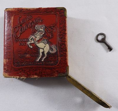 1938 Lone Ranger Strong Box Bank With Key. It does not lock anymore.