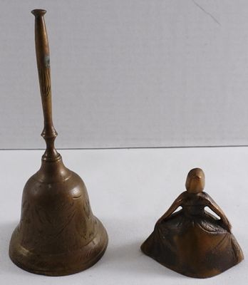 (2) Brass Bells. One is shaped like a Puritan holding out her dress.