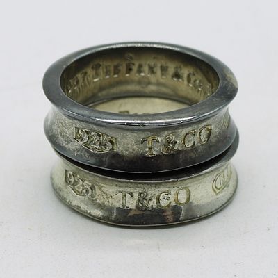 2 Sterling Tiffany & Co Rings. Two sterling Tiffany & Co Rings, Size 8. (6.9 dwt)