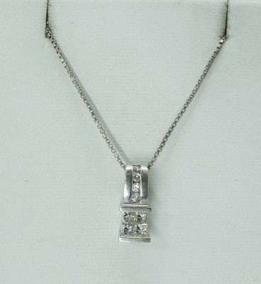 Diamond 14k & Sterling Necklace. Gorgeous 14k white gold diamond pendant on a 20" sterling 