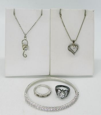 Simulated Diamond 925 Necklaces & More. Simulated diamond sterling jewelry. Two rings, sizes 5 & 