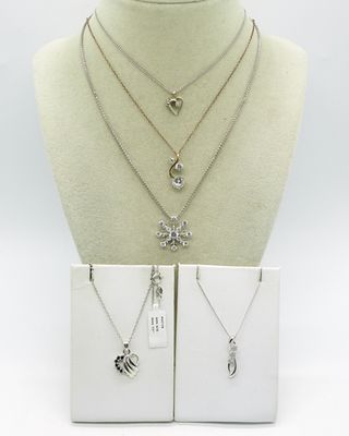 Five Sterling Diamond & CZ Necklaces. Five sterling necklaces. Four with simulated diamonds & 