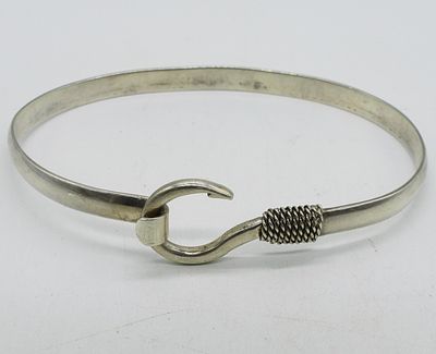 Sterling Fishhook Bangle Bracelet. Sterling fishhook bangle bracelet, 8" around. (11.7 dwt)