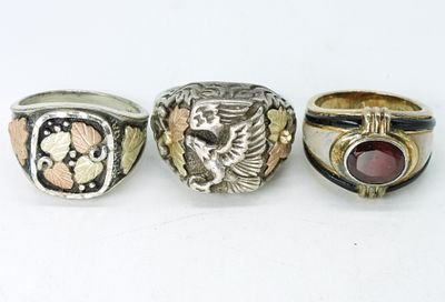 Sterling & 12k Men's Rings. Three rings, sizes 8, 10, 11. Two are sterling and 12k gold (black 