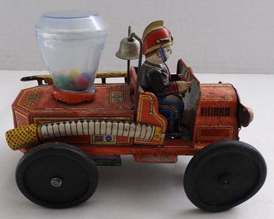 Litho Tin Fire Engine Friction Powered. 1950s-60s, fire engine 1912, corn popper, about 5" long 