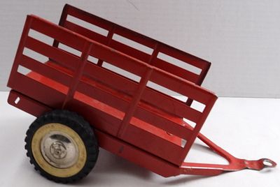 Vintage Tonka Toys Stake Bed Trailer. Red, 2-wheel, some paint scraped off, 6" long, 4" tall 