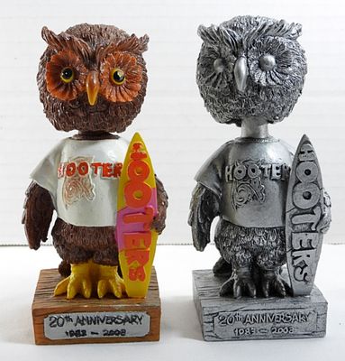 (2) Hooter Owl Bobble Heads. One silver and one regular( left eye is chipped and a little around 