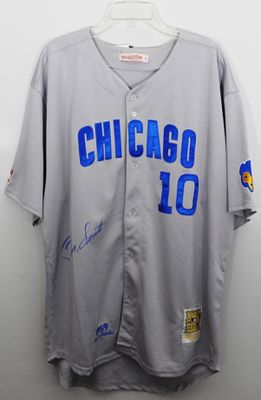 Ron Santo Signed Cubs Mitchell Ness Jersey. Still with its tags, size 54. Signed on the front of 