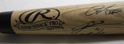 Autographed Rawlings Big Stick Bat. No COA/Unverified unless specified. Unknown autographs on 