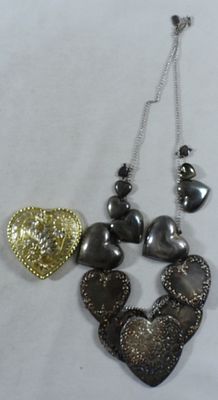 Heart Belt Buckle & Large Heart Necklace. Visit us on Facebook today
