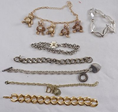 (7) Chunky Chain Bracelets. Mostly silver-toned bracelets except 2 gold toned bracelet