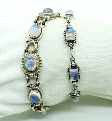 Two Sterling Moonstone Bracelets. Two sterling moonstone bracelets, 6.5" - 8". (22 dwt) (6x4x2)