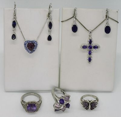 Amethyst Rings and Earrings in Sterling. Three sterling rings with amethyst gemstones, sizes 5 