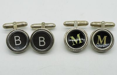 Two Pair of Sterling Cuff Links. Two pair of sterling cuff links. 3/4" wide. (17 dwt) (6x4x2)