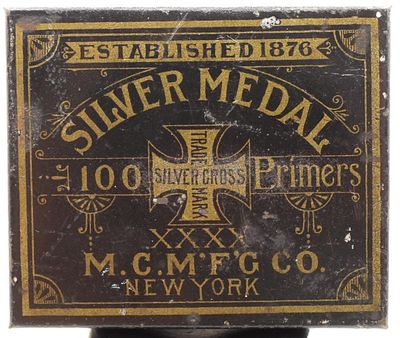 M.C.M'F'G Co. Silver Medal Primers Tin. M.C. M'F'G Co. New York Silver Medal 100 Primers Tin.
