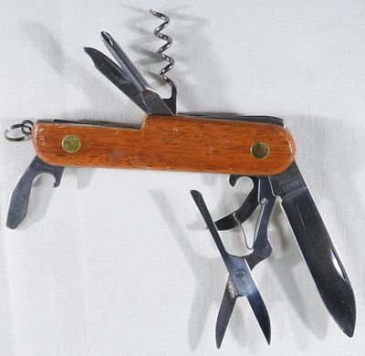 Eight Tool Utility Knife. Wooden handle.