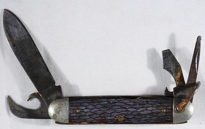 Four-Blade Boy Scouts Pocket Knife. Visit us on Facebook!